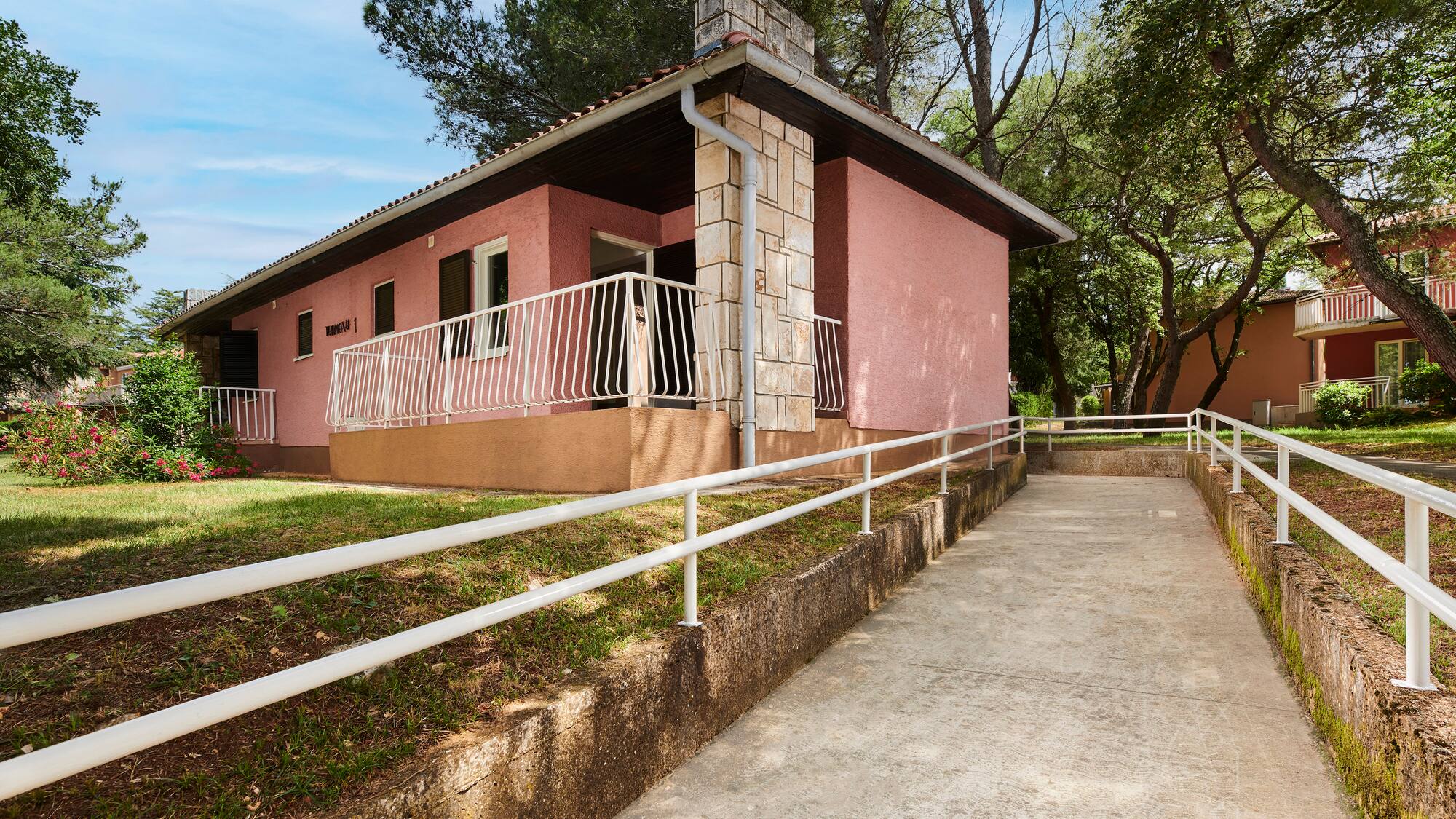 a house with a ramp leading to it