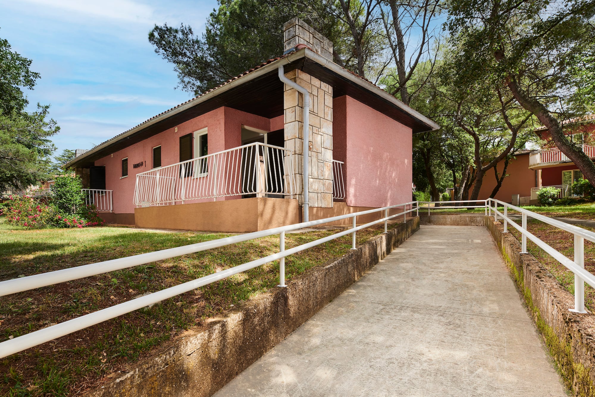 a house with a ramp leading to it