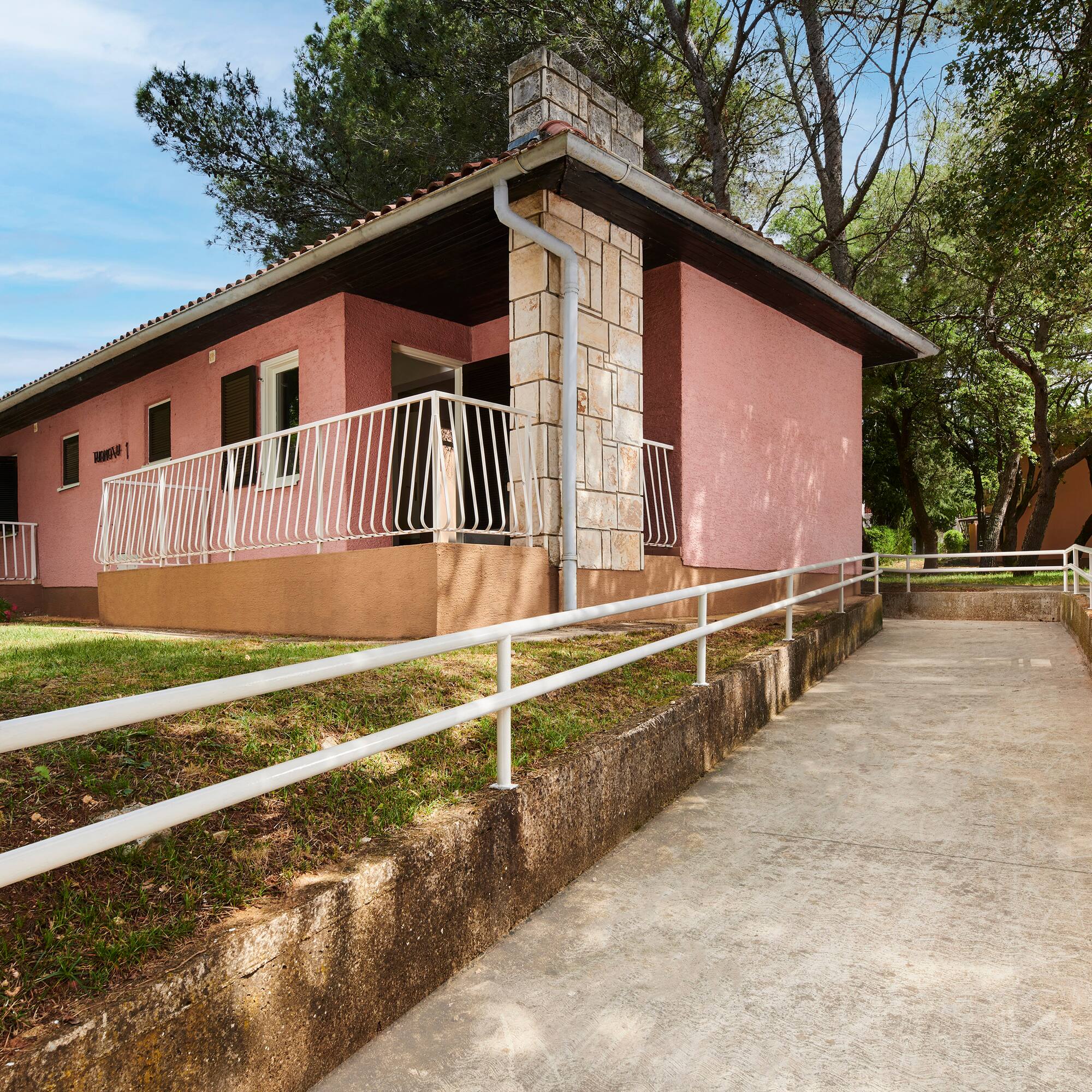 a house with a ramp leading to it