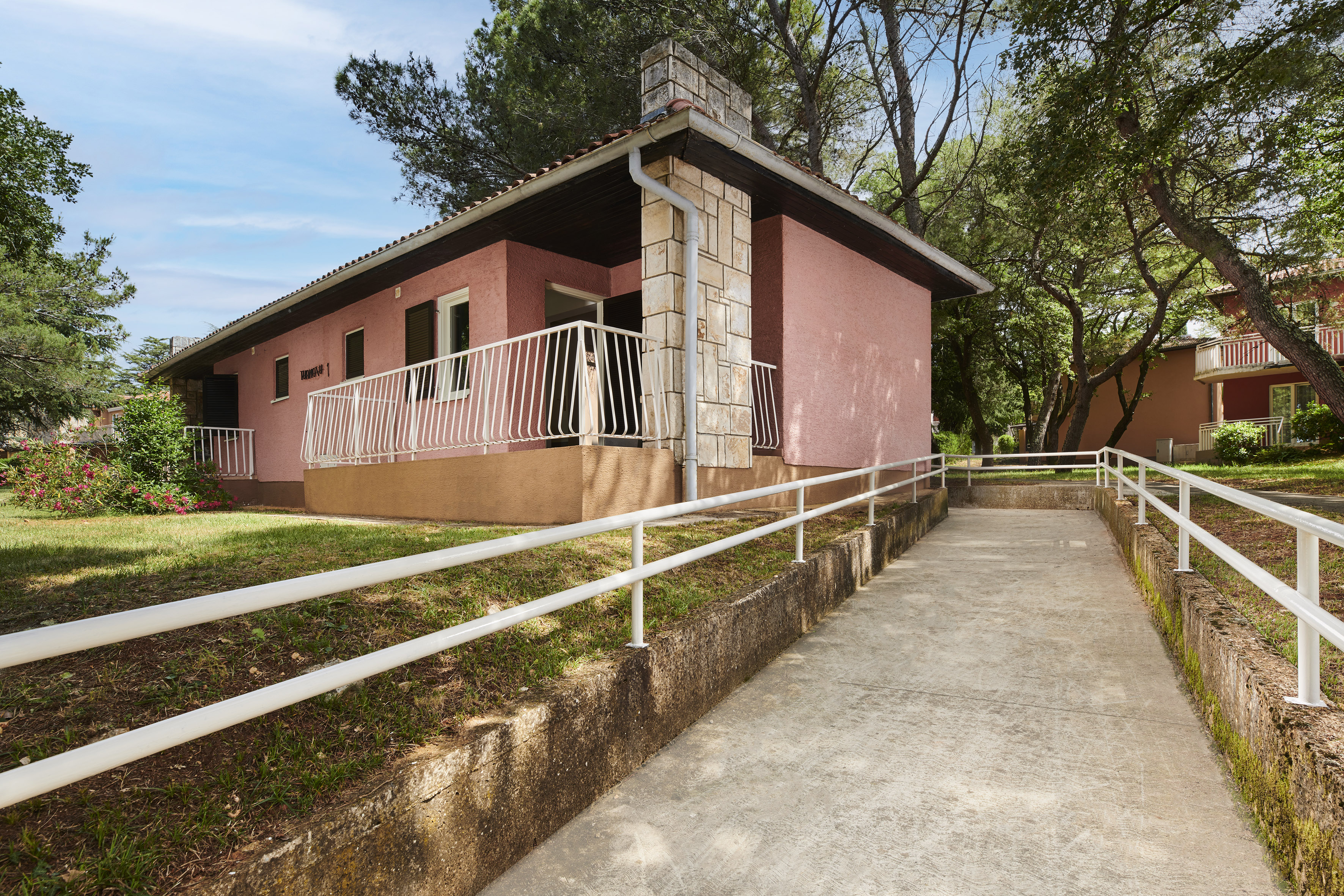 a house with a ramp leading to it