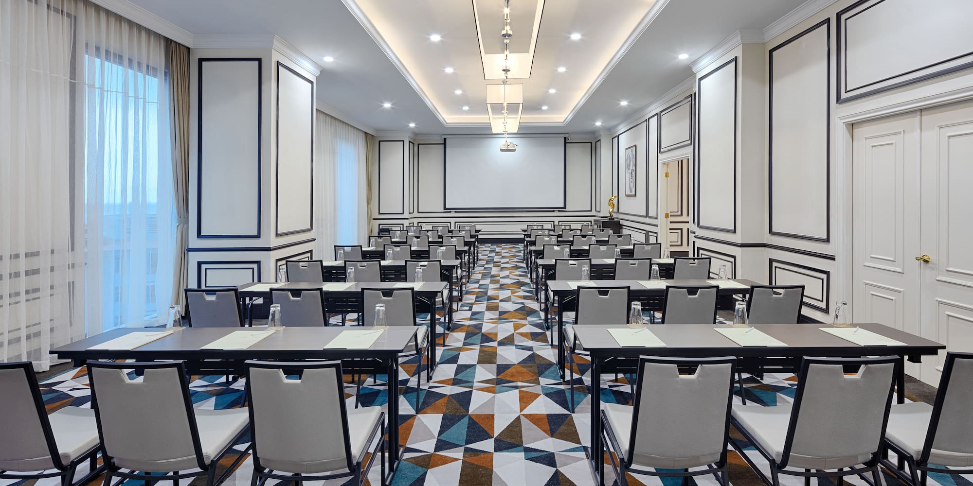 a room with tables and chairs