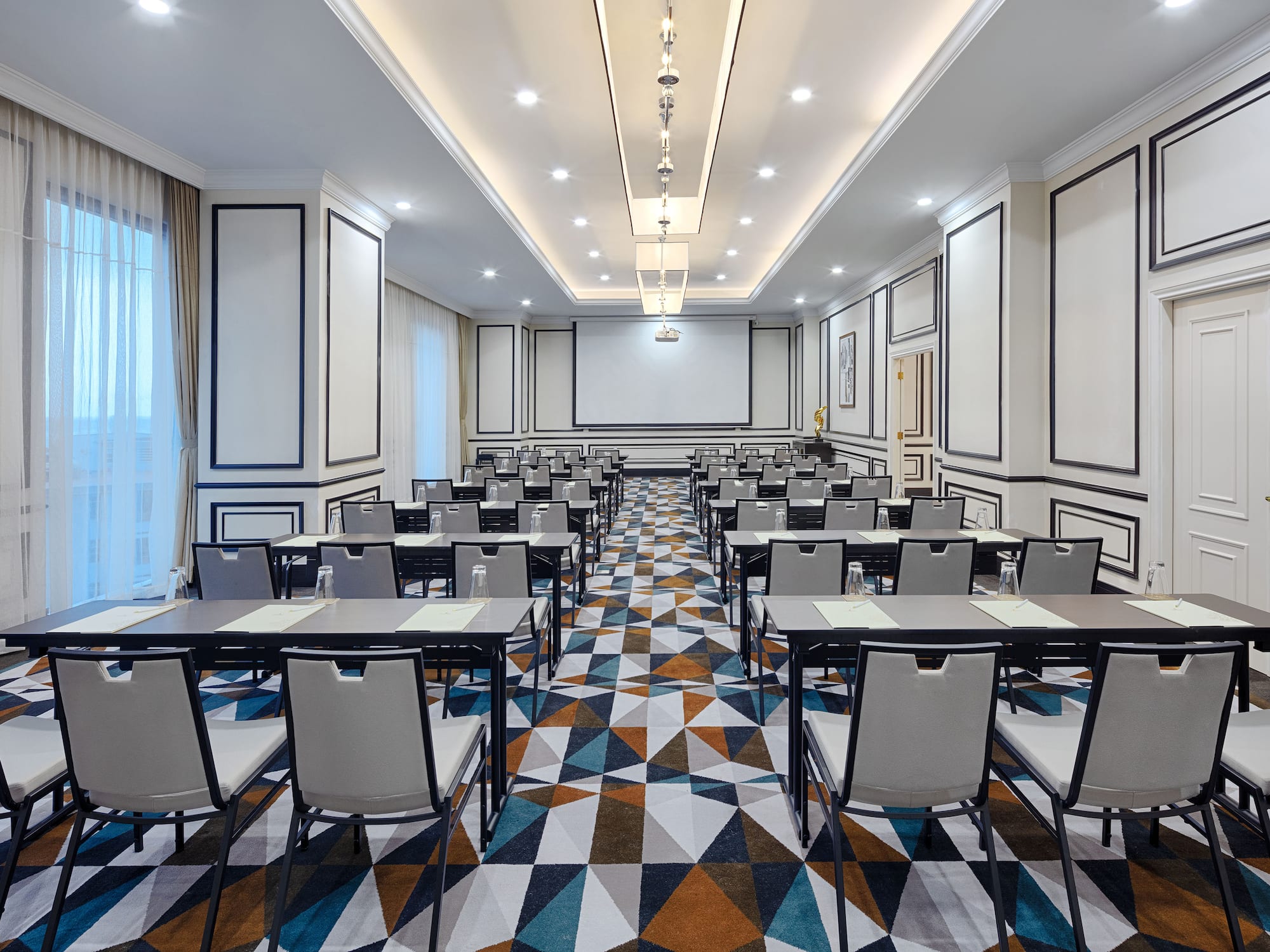 a room with tables and chairs