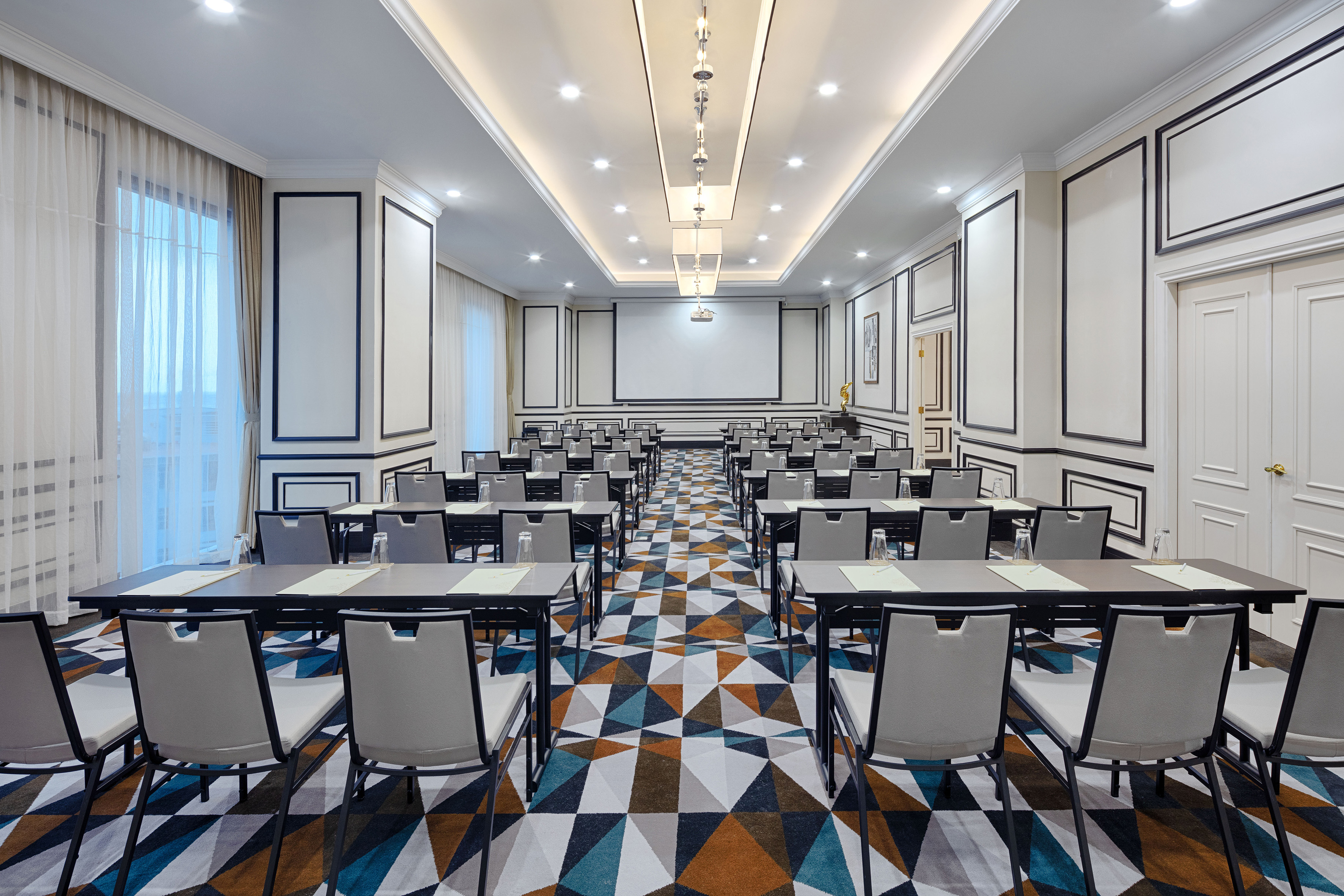 a room with tables and chairs