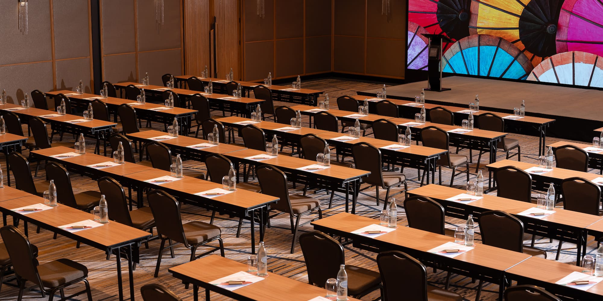 a large room with tables and chairs