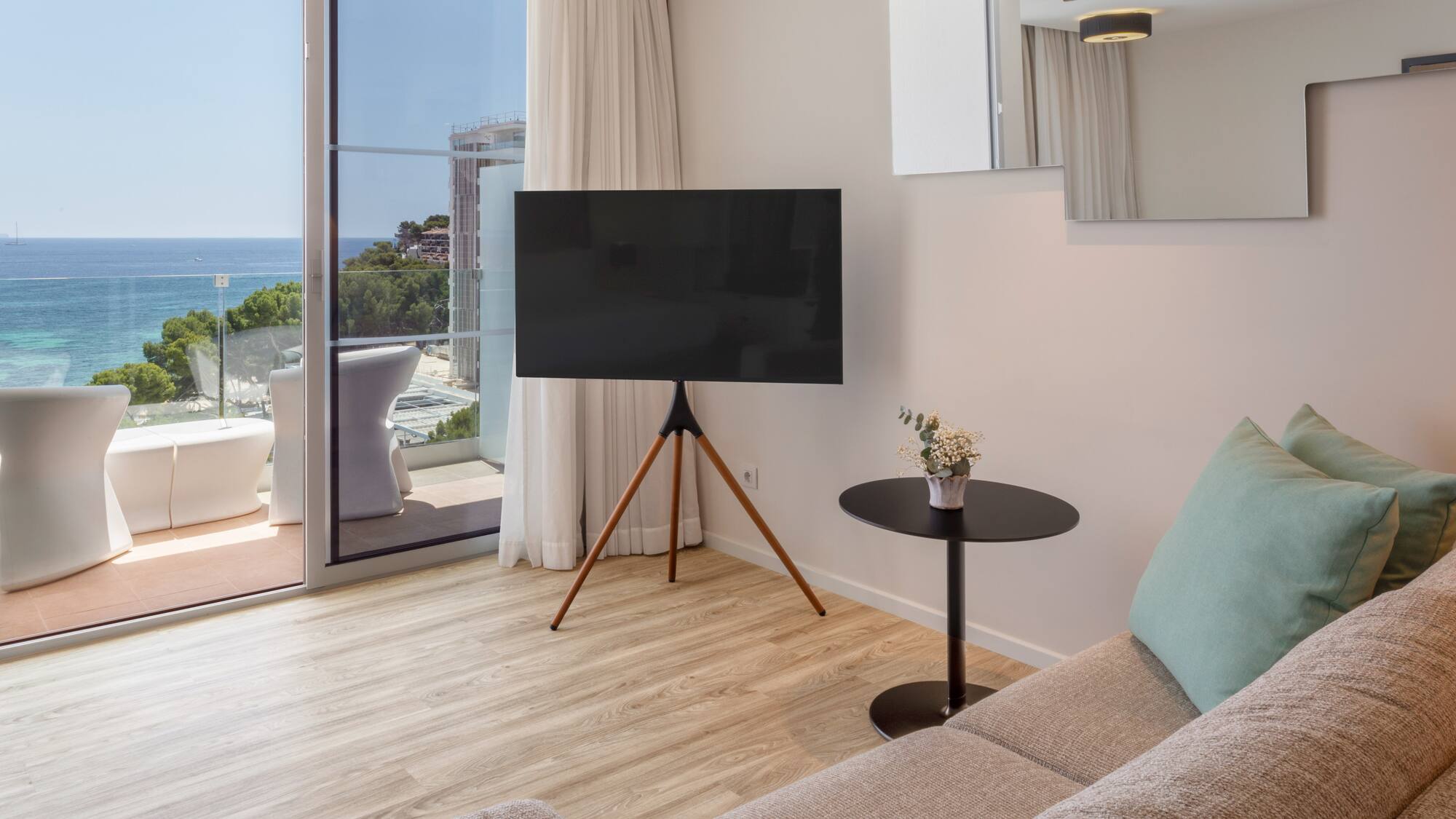 a living room with a television and a couch