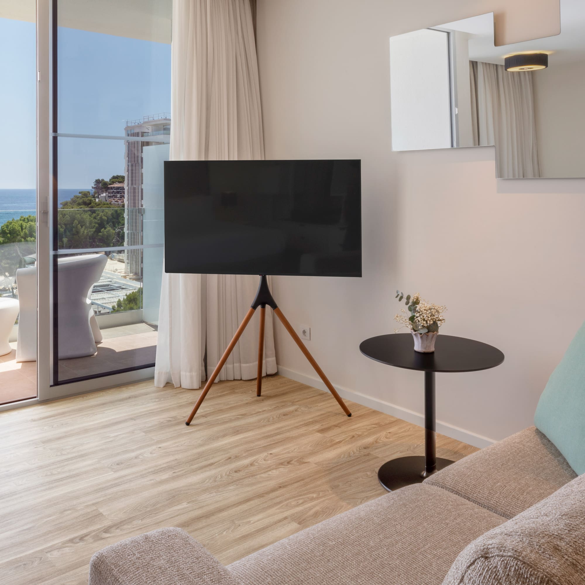 a living room with a television and a couch