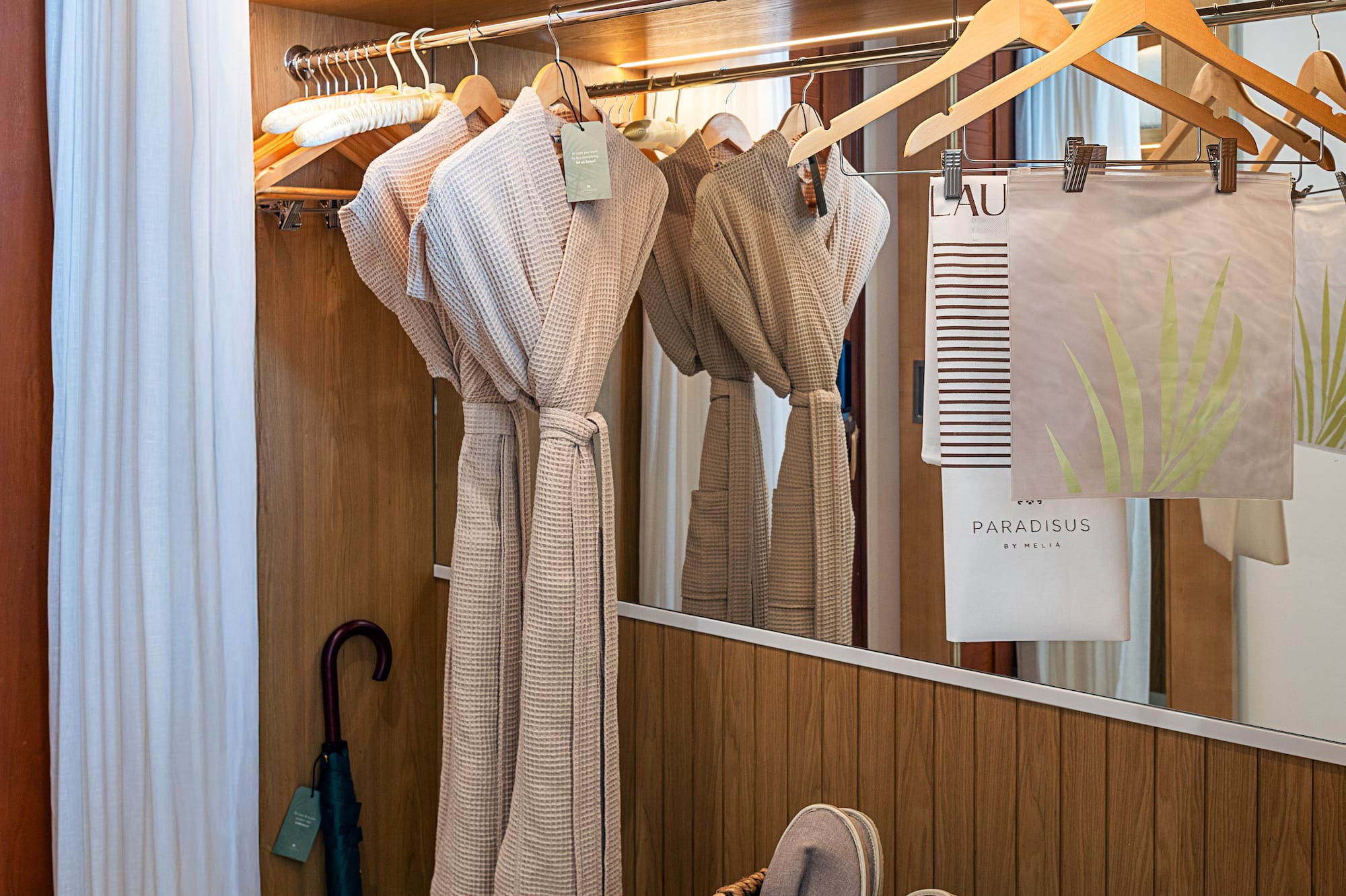 a bathroom with towels and towels on swingers