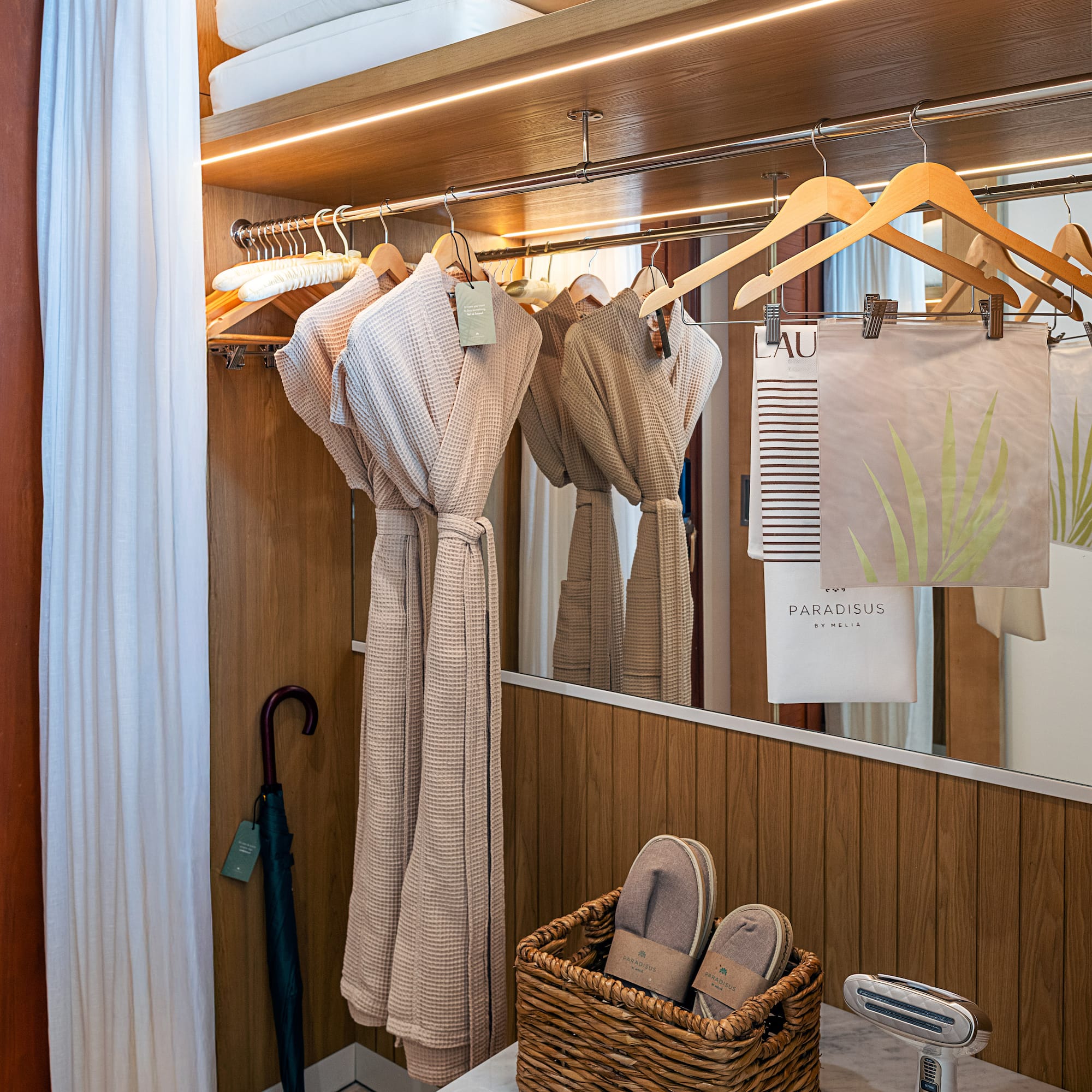 a bathroom with towels and towels on swingers