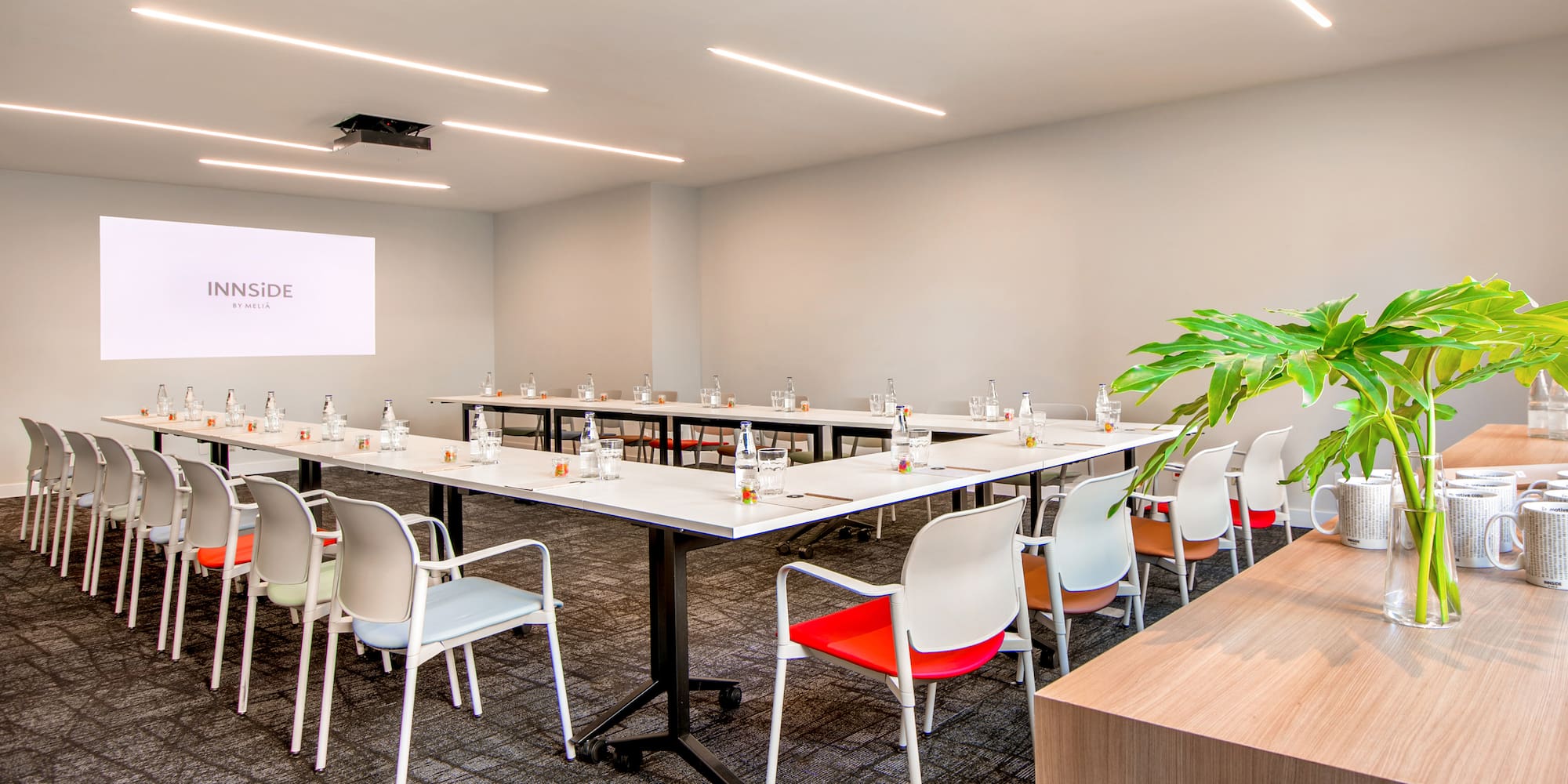 a room with tables and chairs