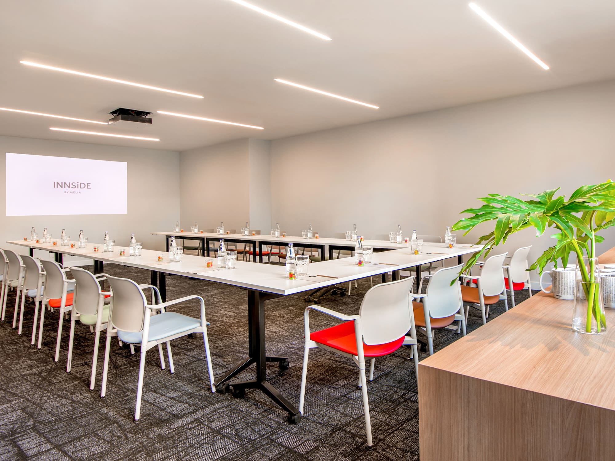 a room with tables and chairs