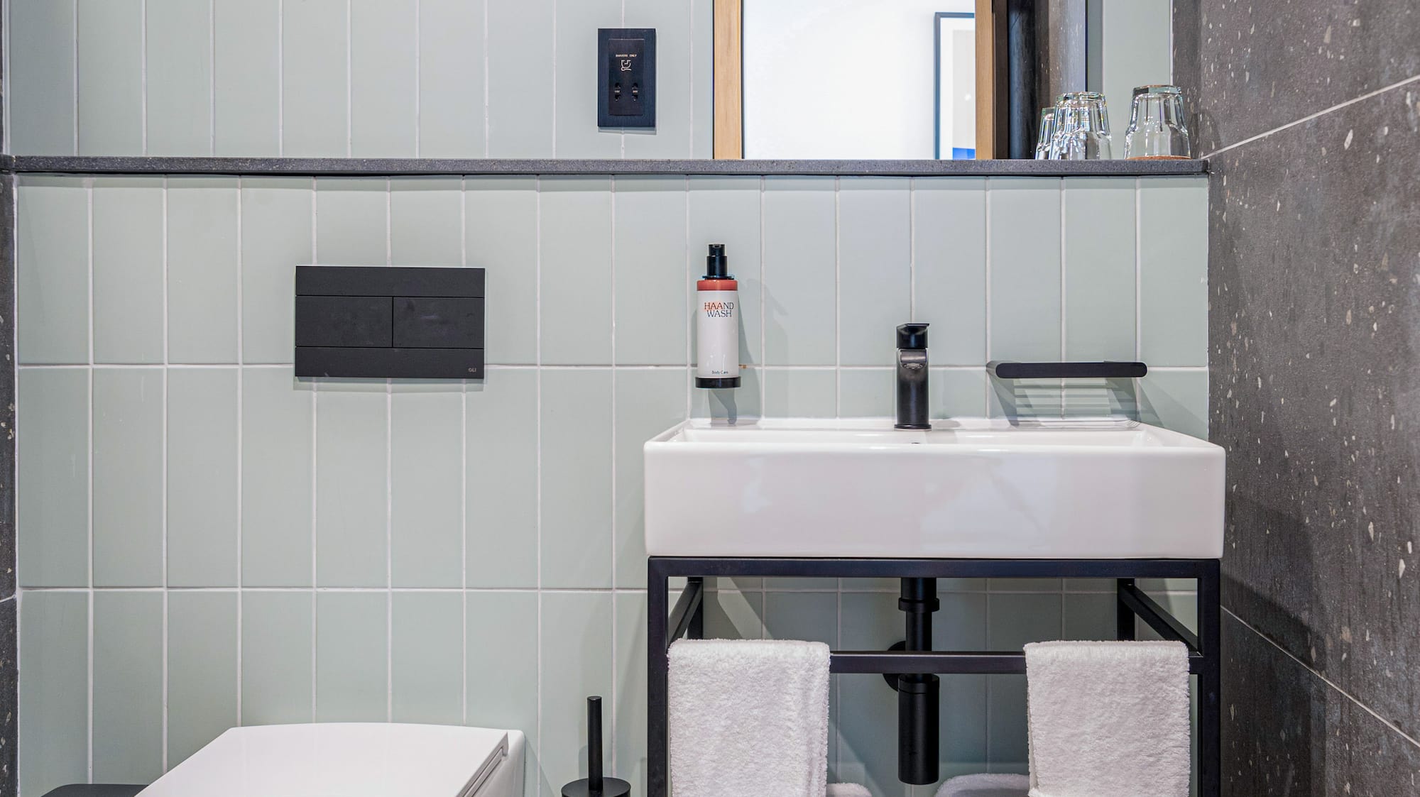 a bathroom with a sink and toilet