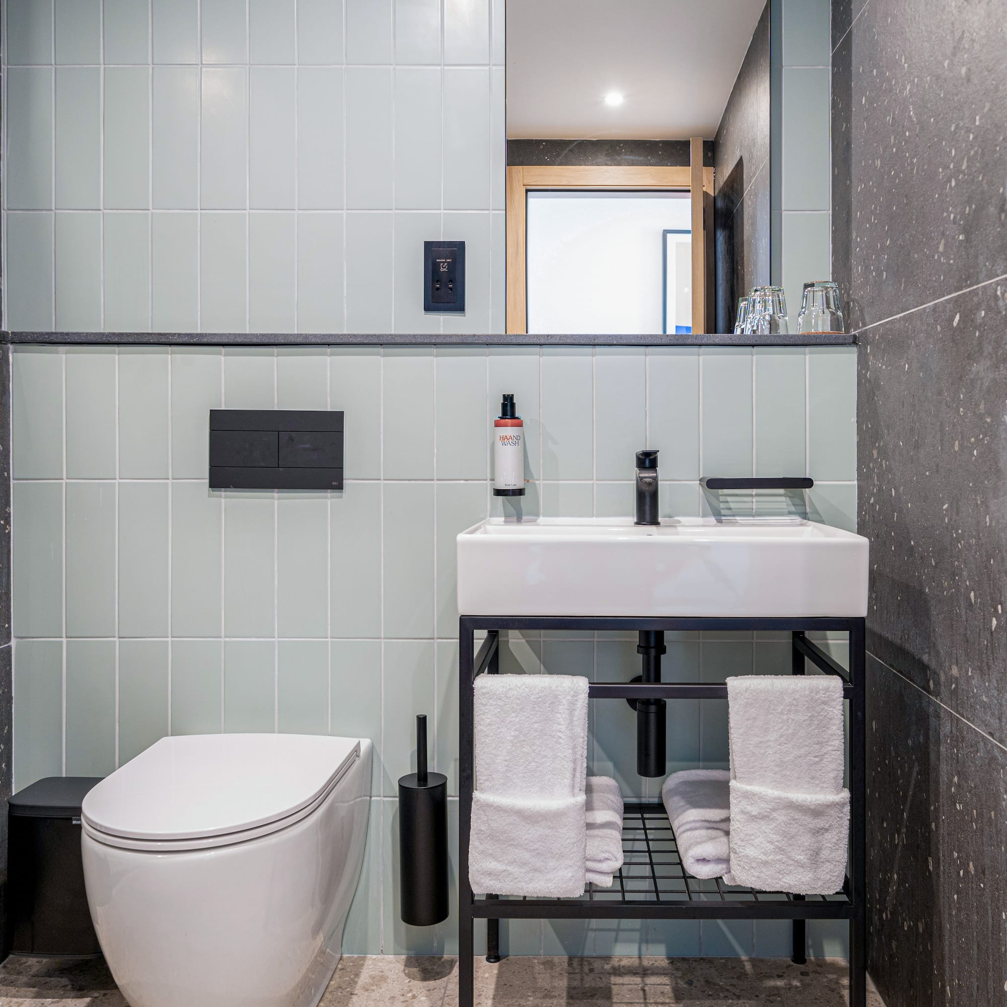 a bathroom with a sink and toilet