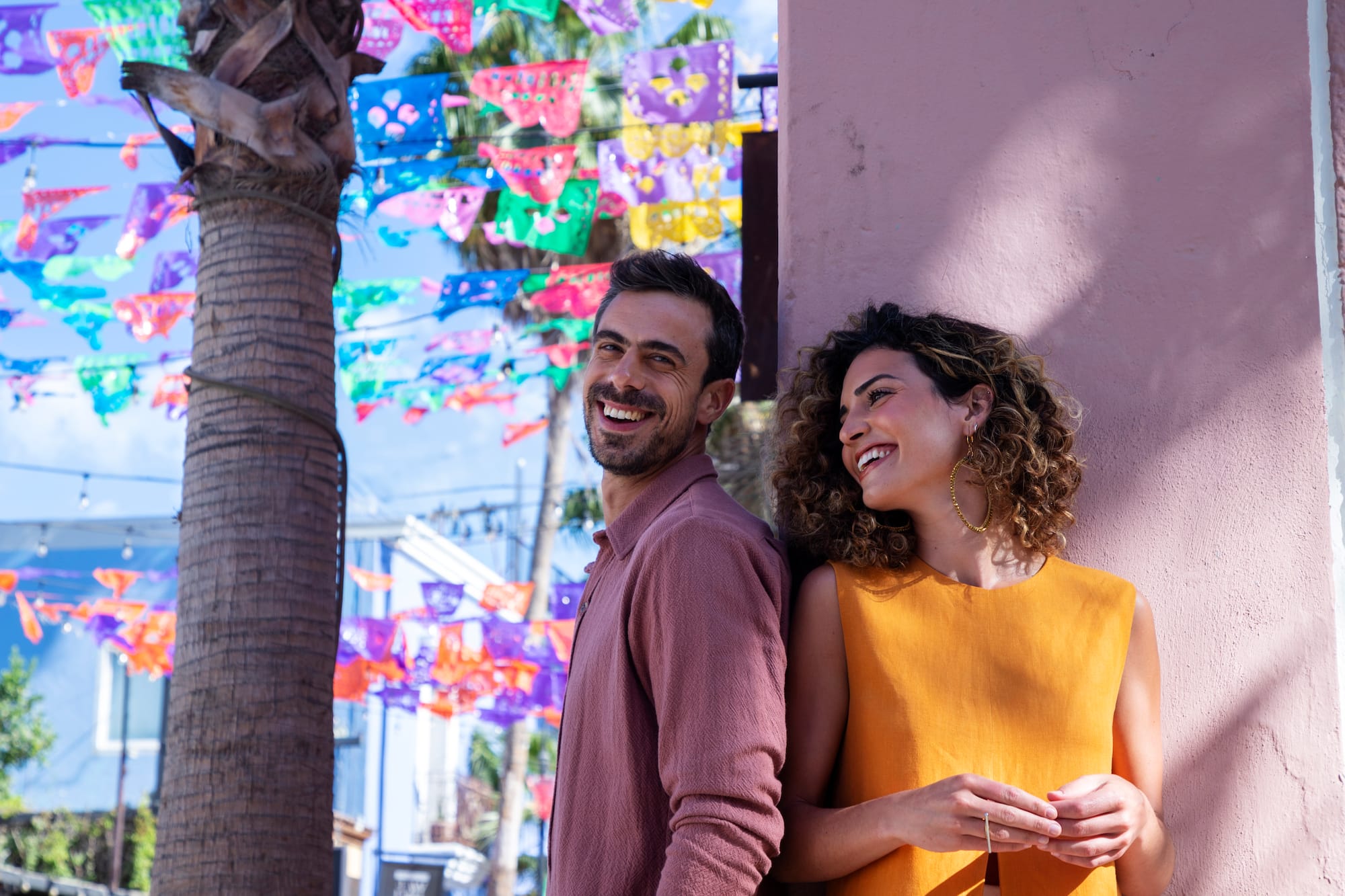 a man and woman standing next to each other