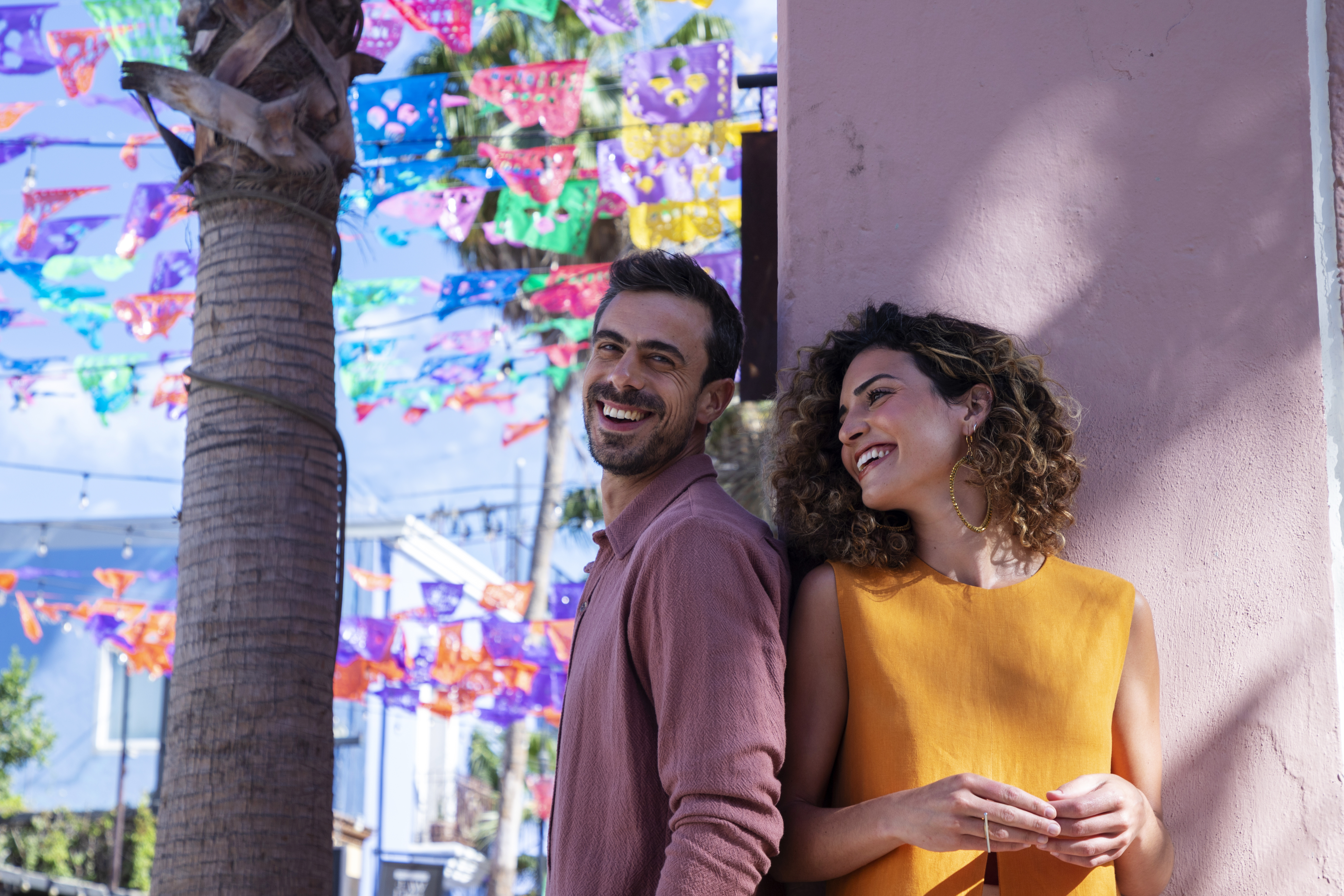 a man and woman standing next to each other