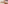 Person in mauve activewear holding a beige textured yoga mat.