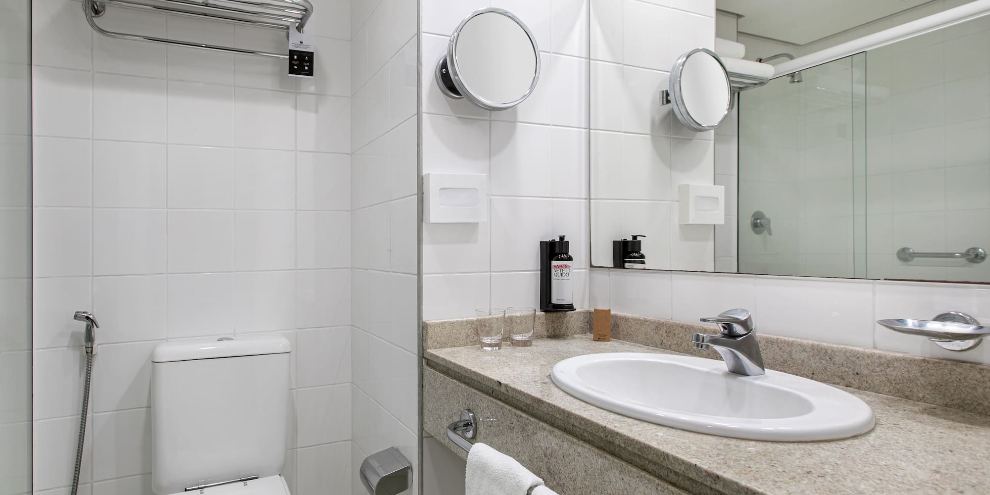 a bathroom with a sink and mirror