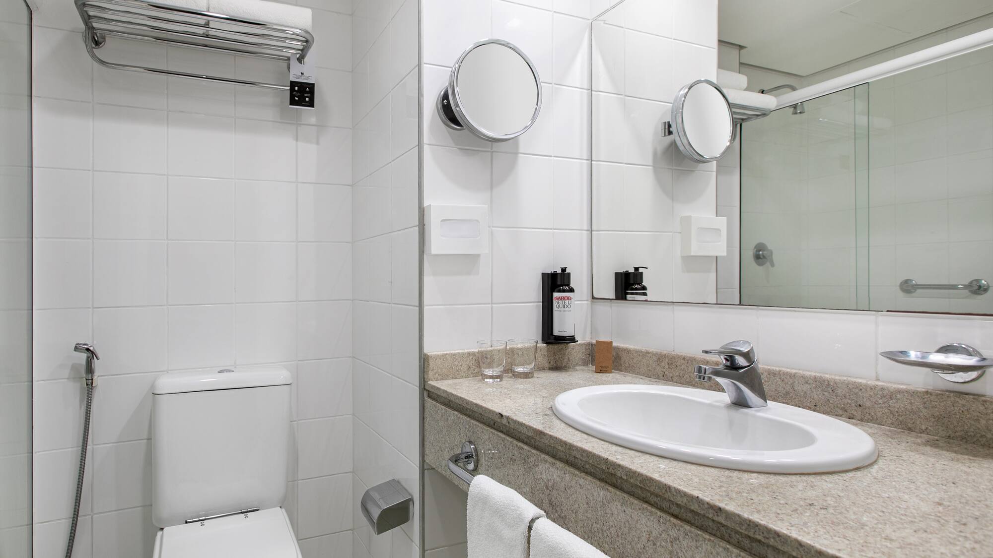 a bathroom with a sink and mirror