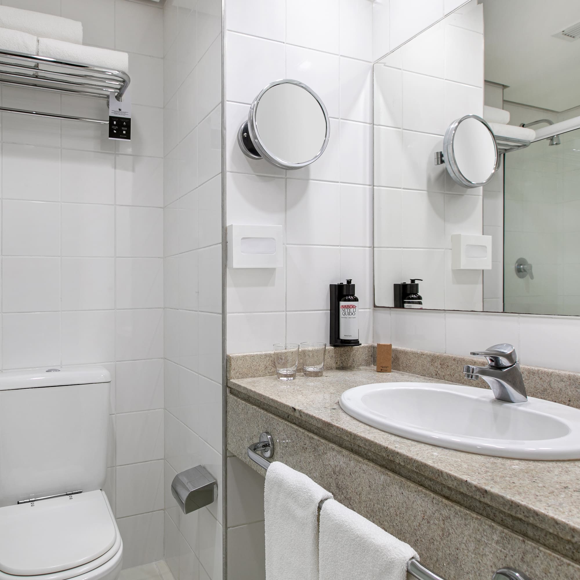 a bathroom with a sink and mirror
