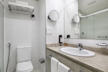 a bathroom with a sink and mirror
