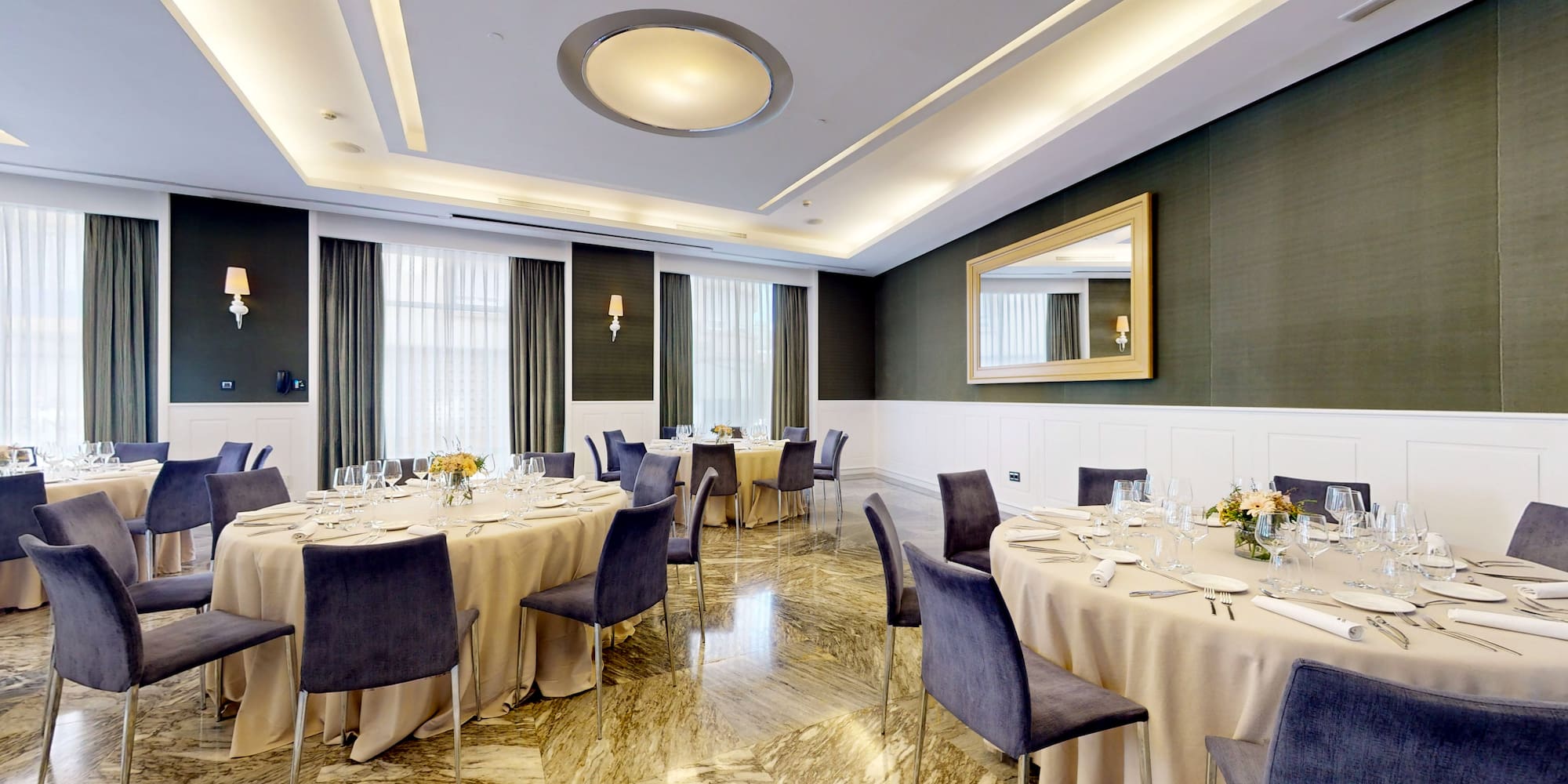 a room with tables and chairs