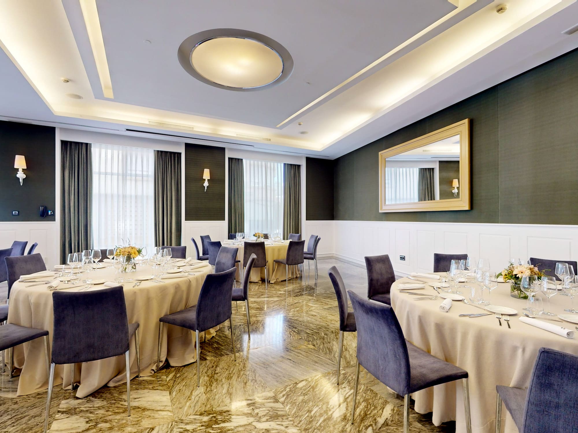 a room with tables and chairs