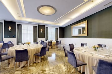 a room with tables and chairs