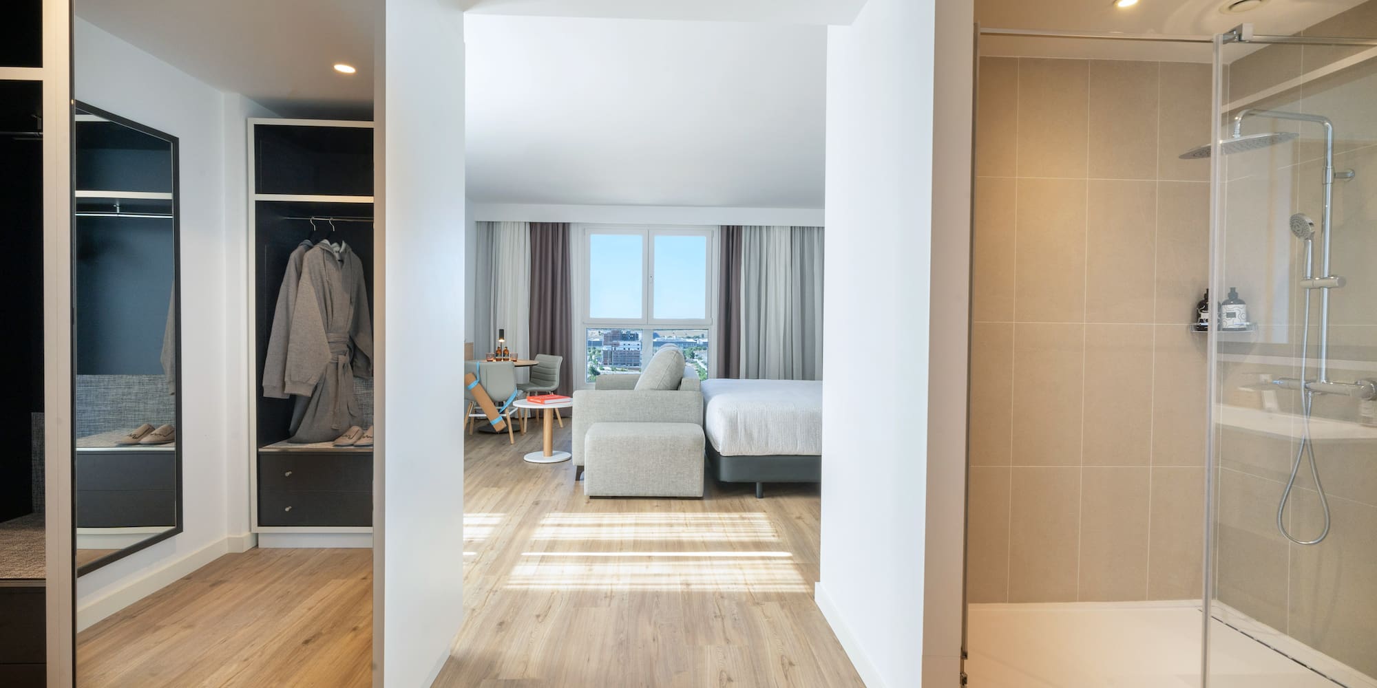 a room with a bed and a shower