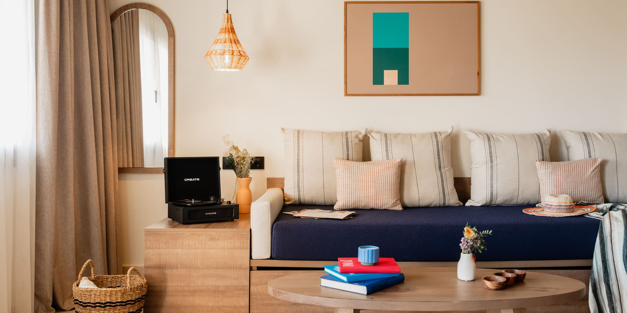 a couch with pillows and a coffee table