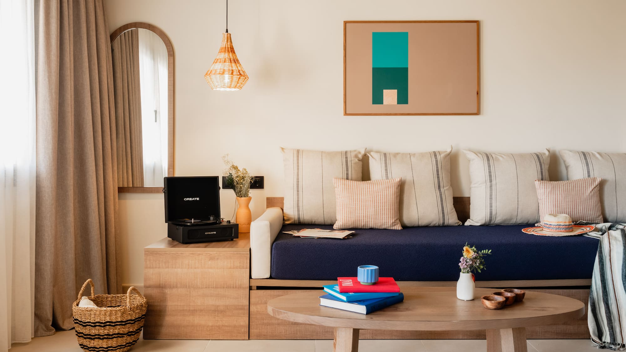 a couch with pillows and a coffee table