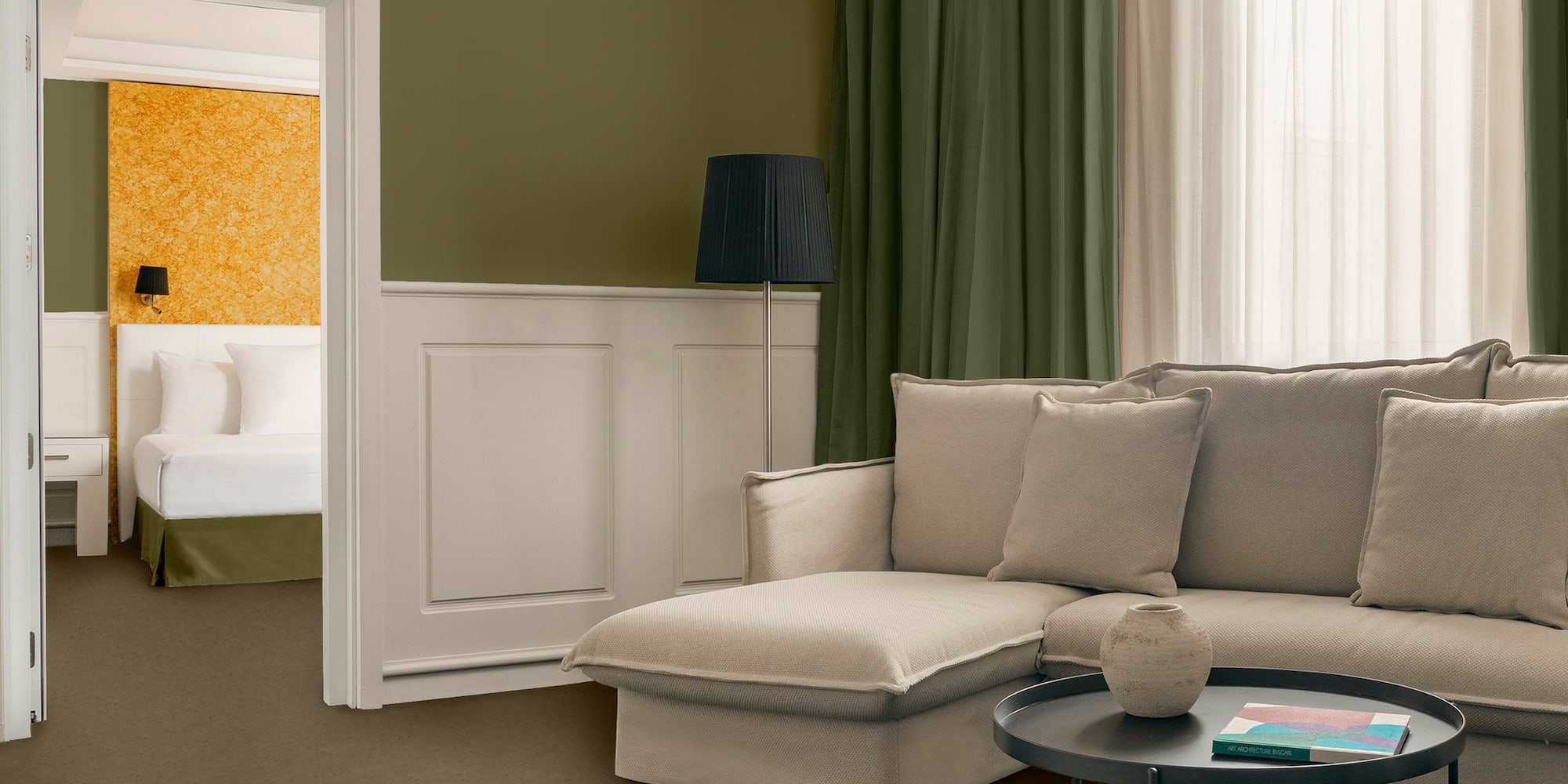 a living room with a couch and a table