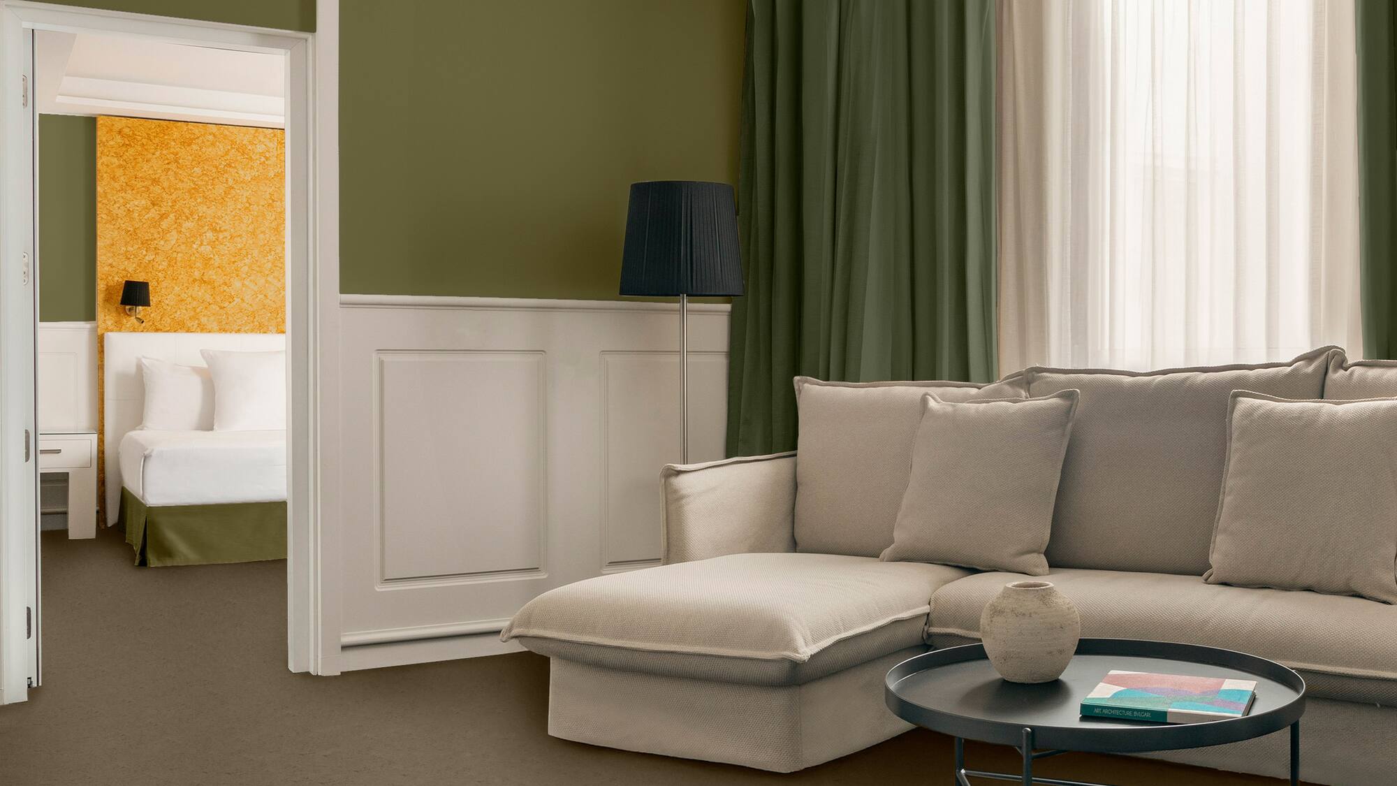 a living room with a couch and a table