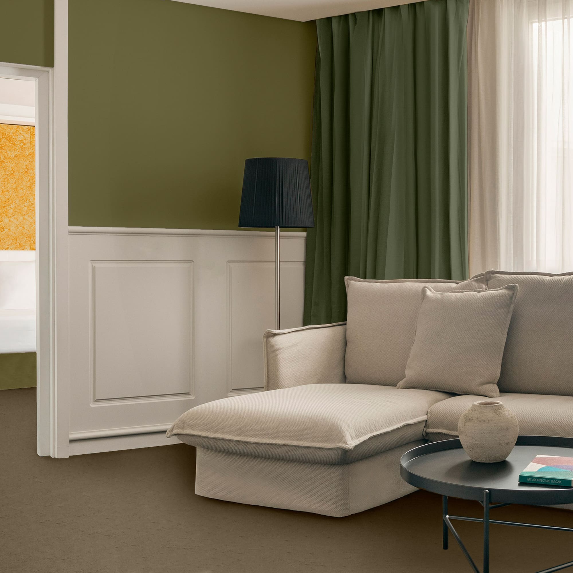 a living room with a couch and a table