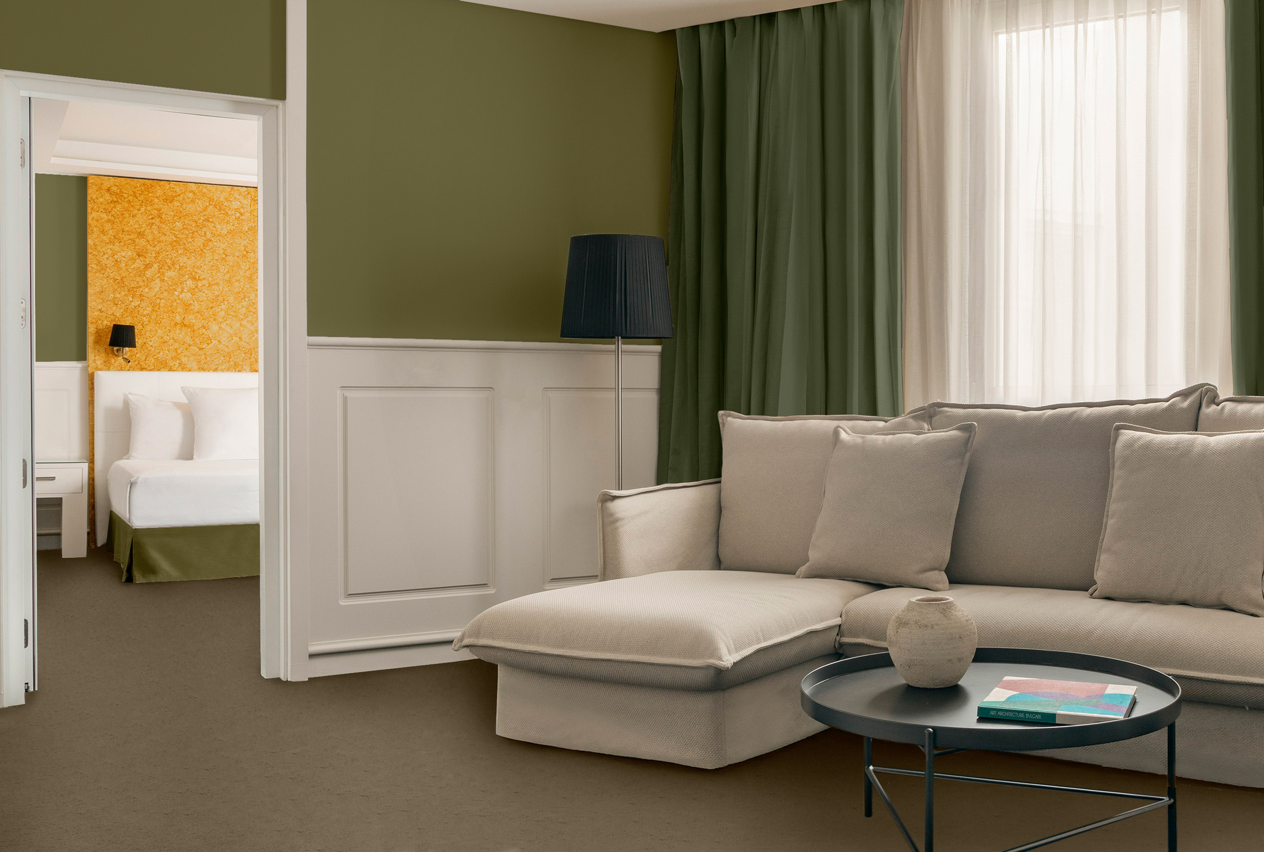 a living room with a couch and a table