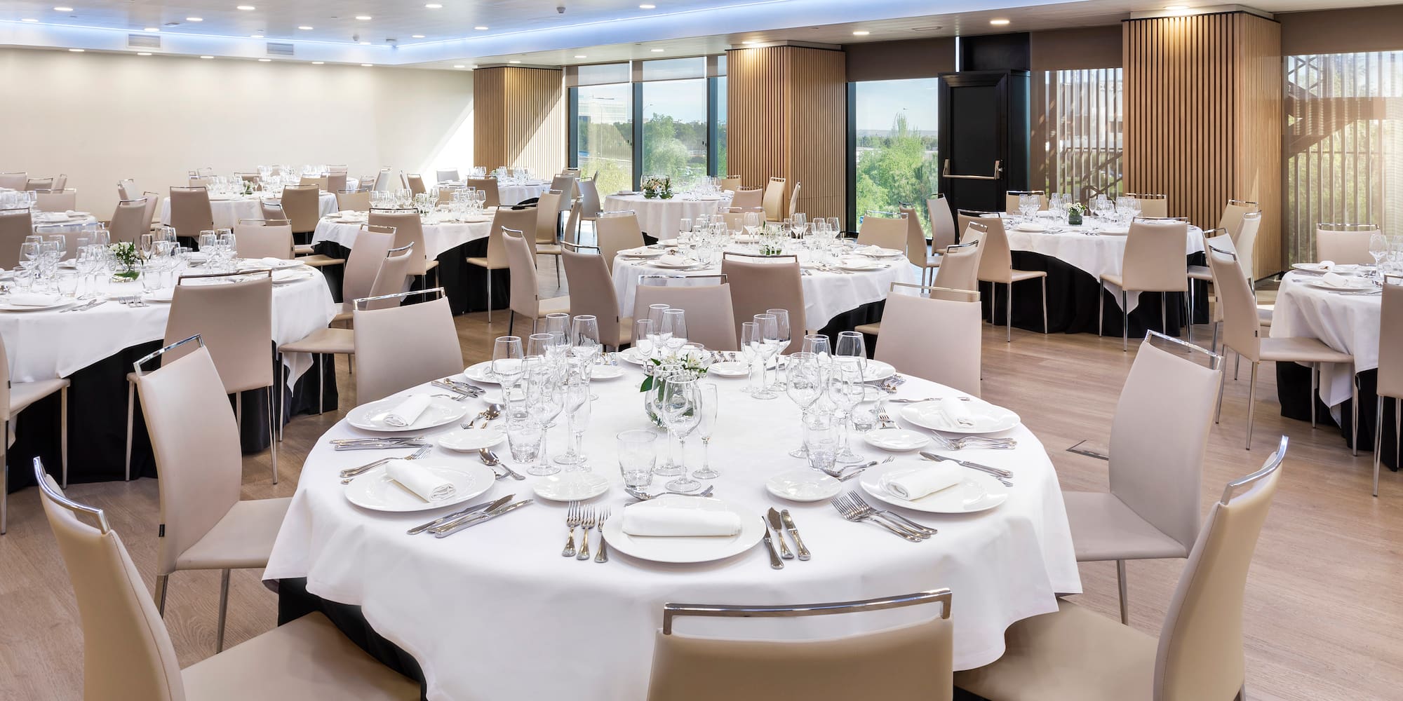 a room with tables and chairs