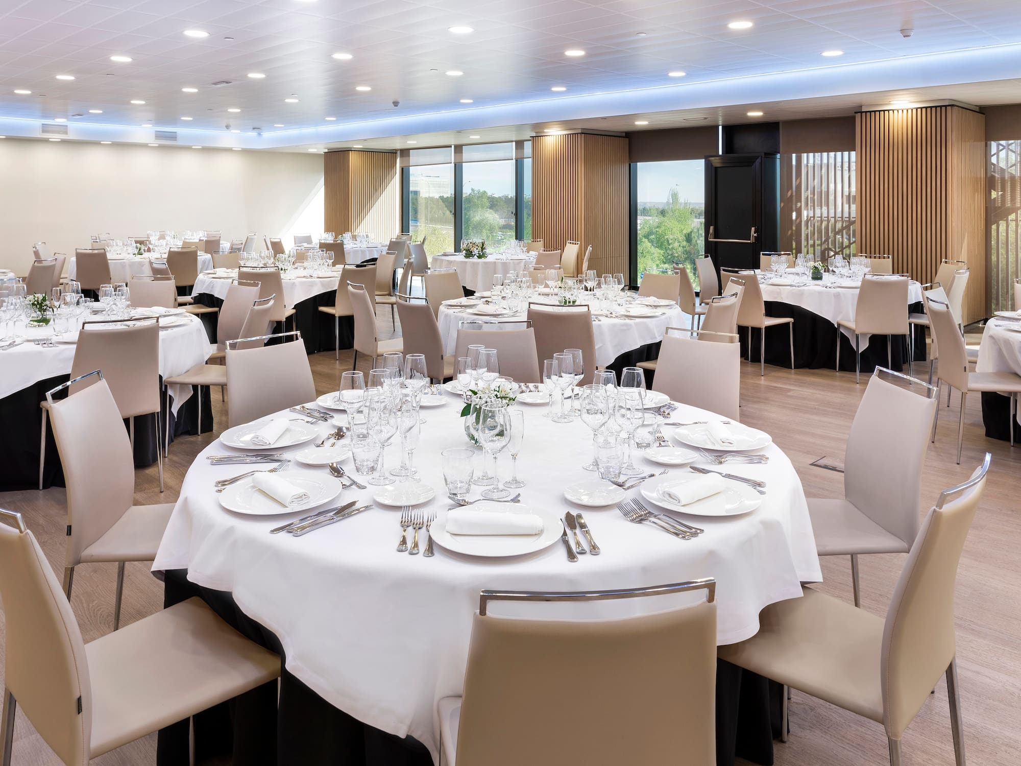 a room with tables and chairs