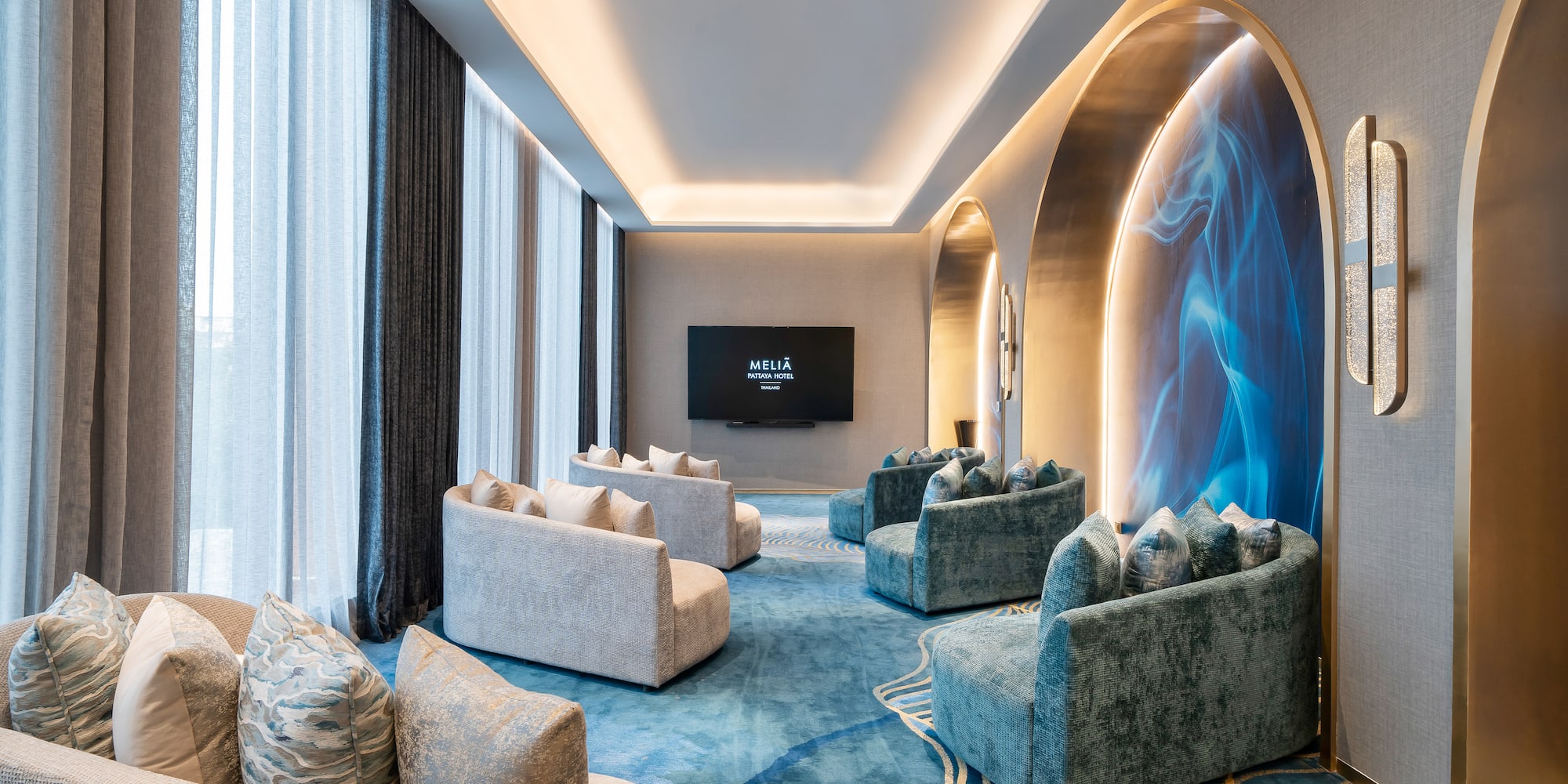 a room with couches and a tv