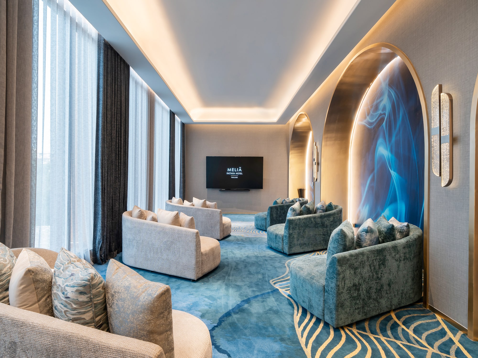 a room with couches and a tv