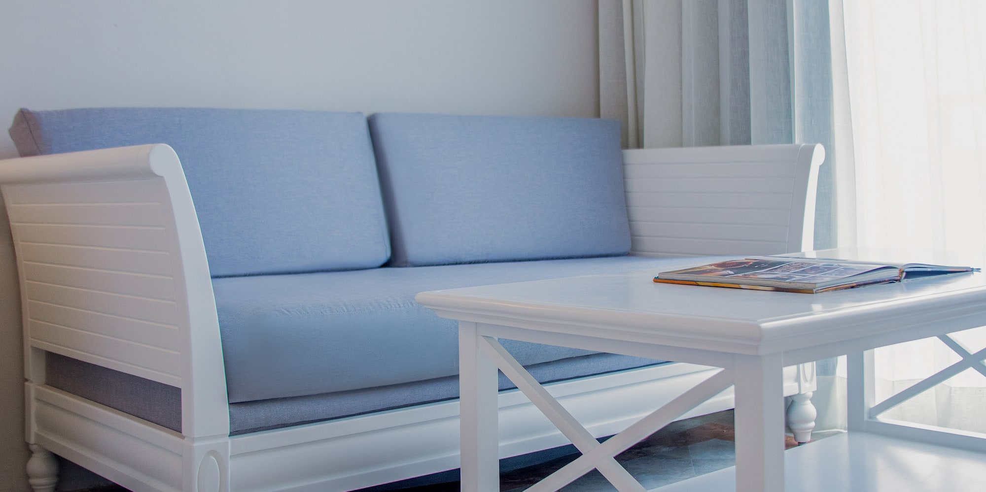 a couch and coffee table in a room