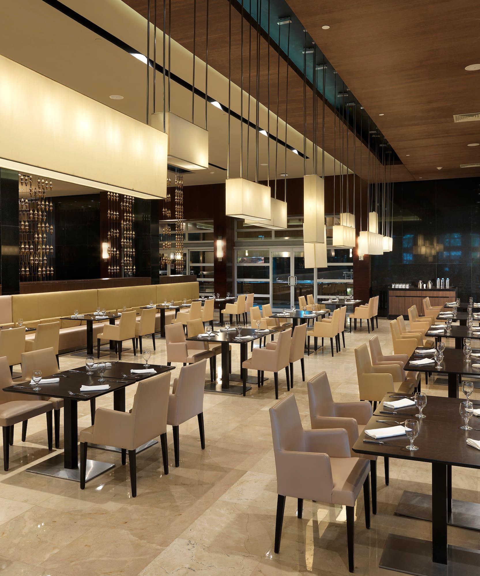 a restaurant with tables and chairs