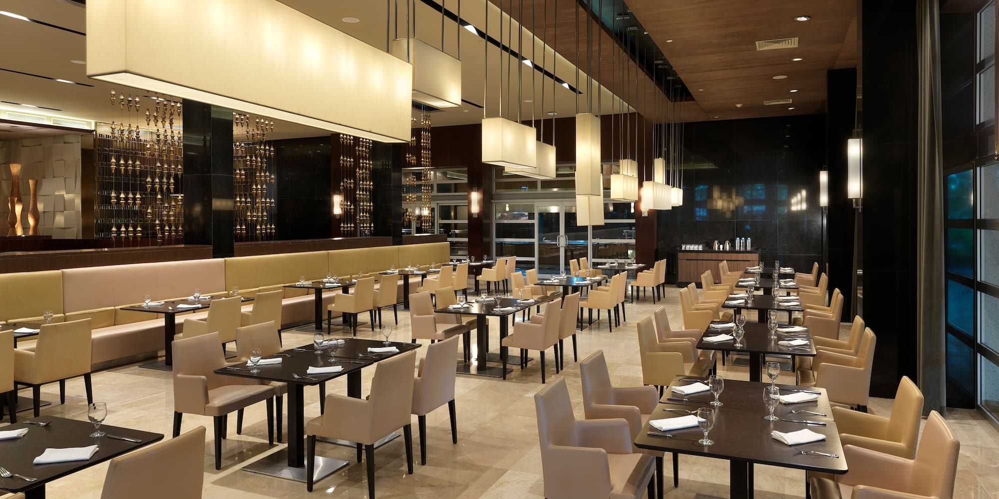 a restaurant with tables and chairs