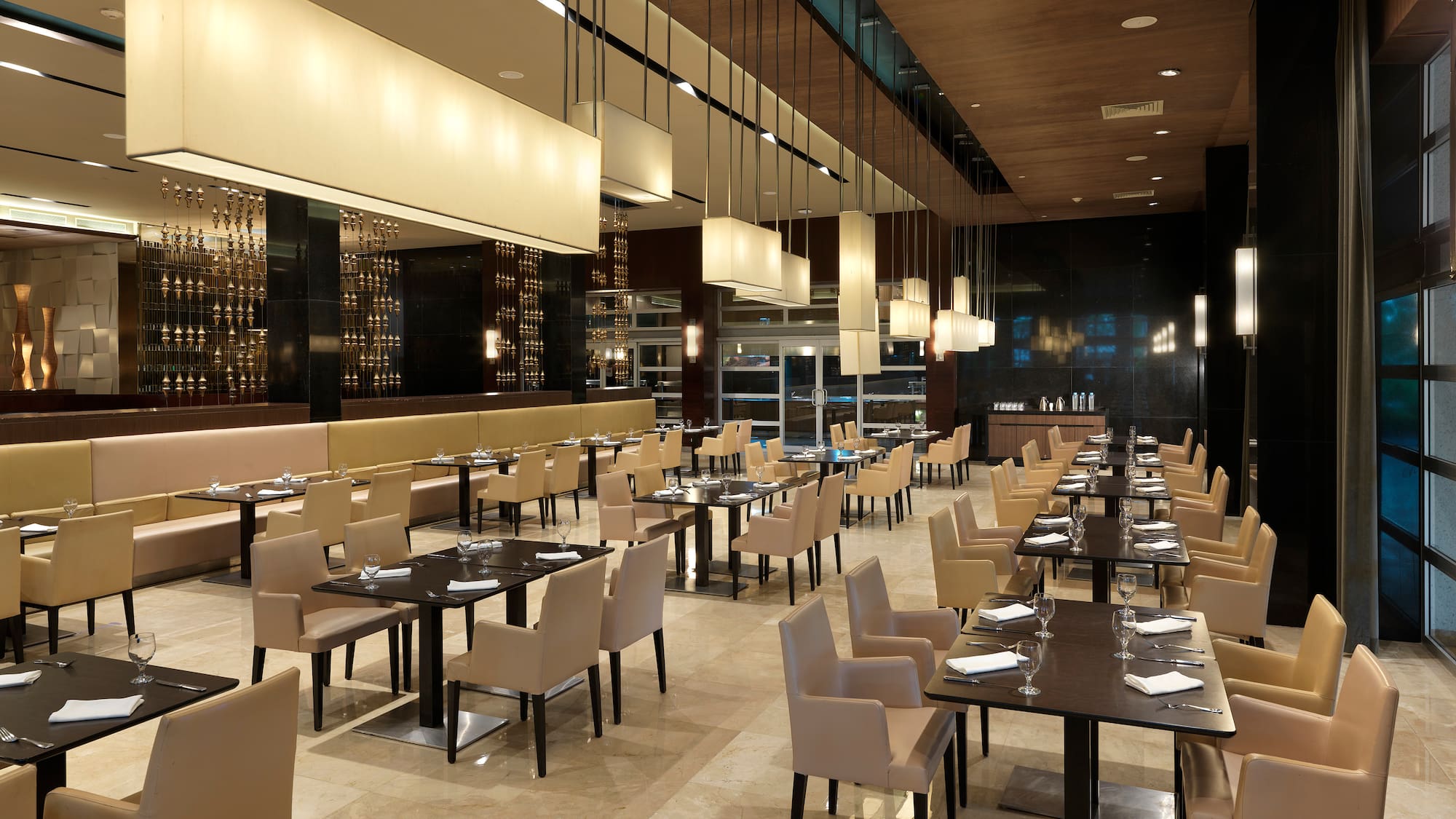 a restaurant with tables and chairs