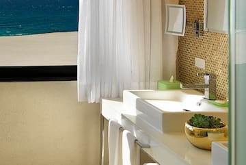 a bathroom with a sink and a window
