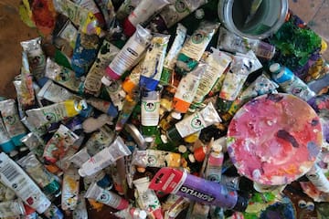 a group of tubes of paint