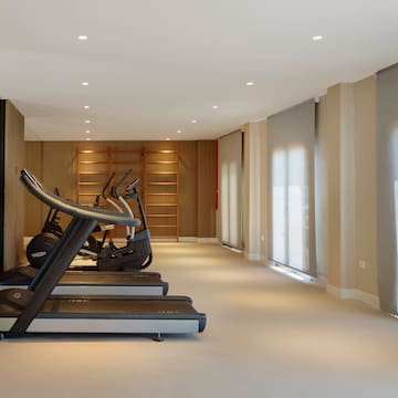a room with treadmills and exercise machines