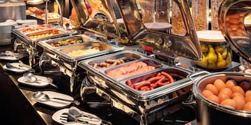 a buffet with food in it