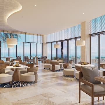 a room with tables and chairs