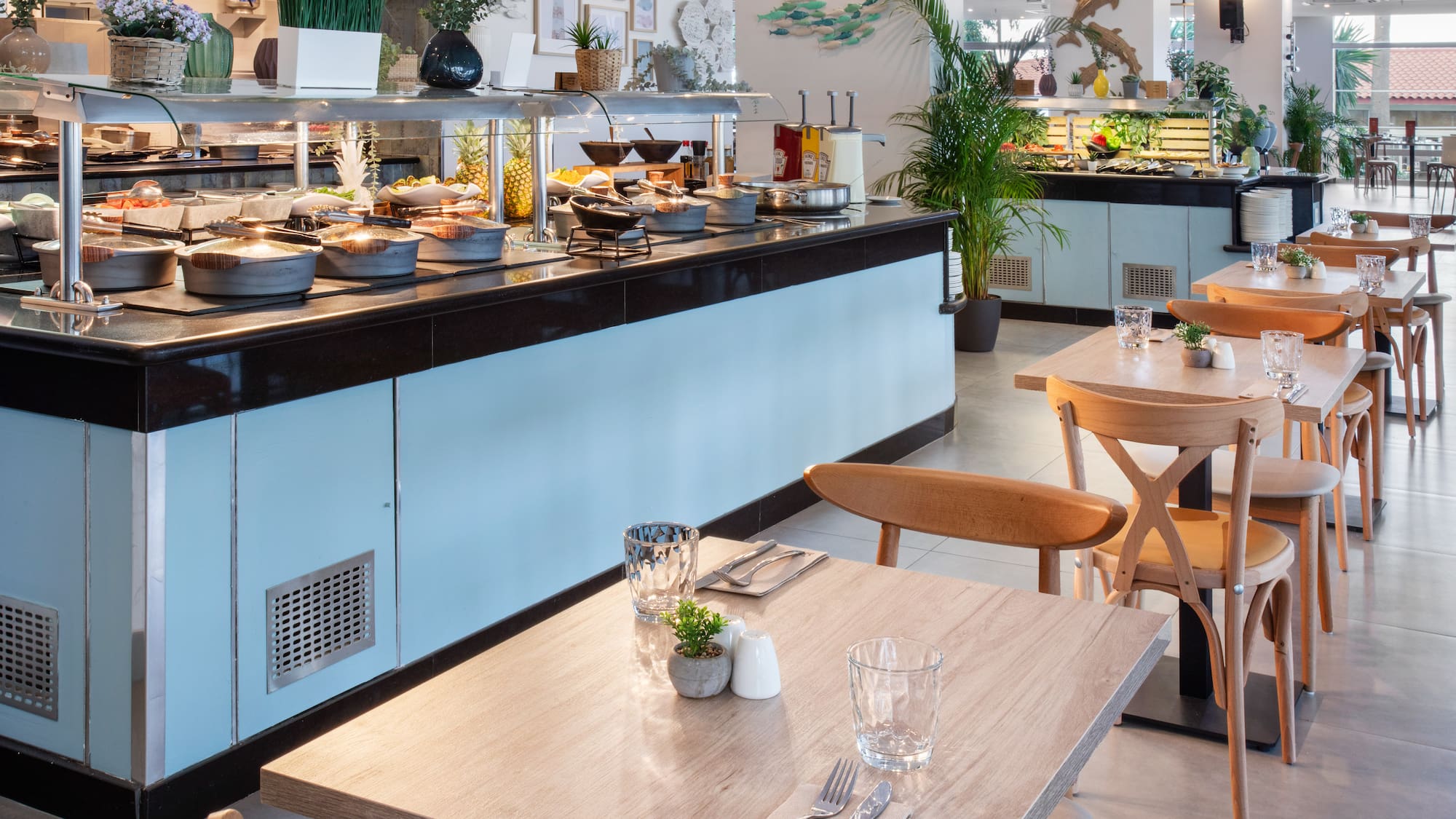 a restaurant with food on the counter