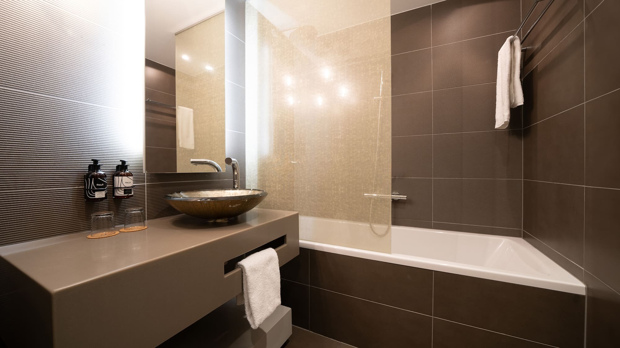 a bathroom with a sink and bathtub