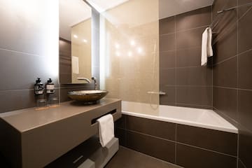 a bathroom with a sink and bathtub