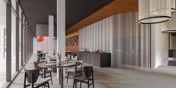 a room with a table and chairs
